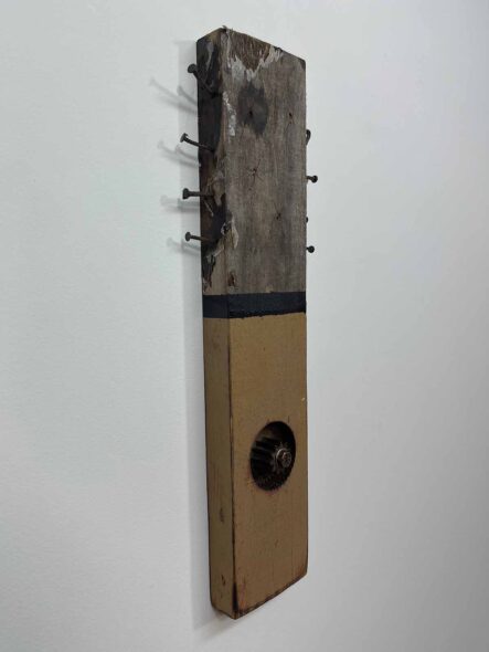 Remnants II: Assemblage No. 14 | Apx. 16" x 5.5" x 2.5" each | nails, paint, tar, tissue paper, double spur gear, socket head cap screws, and hex bolt on reclaimed pallet wood | 2018