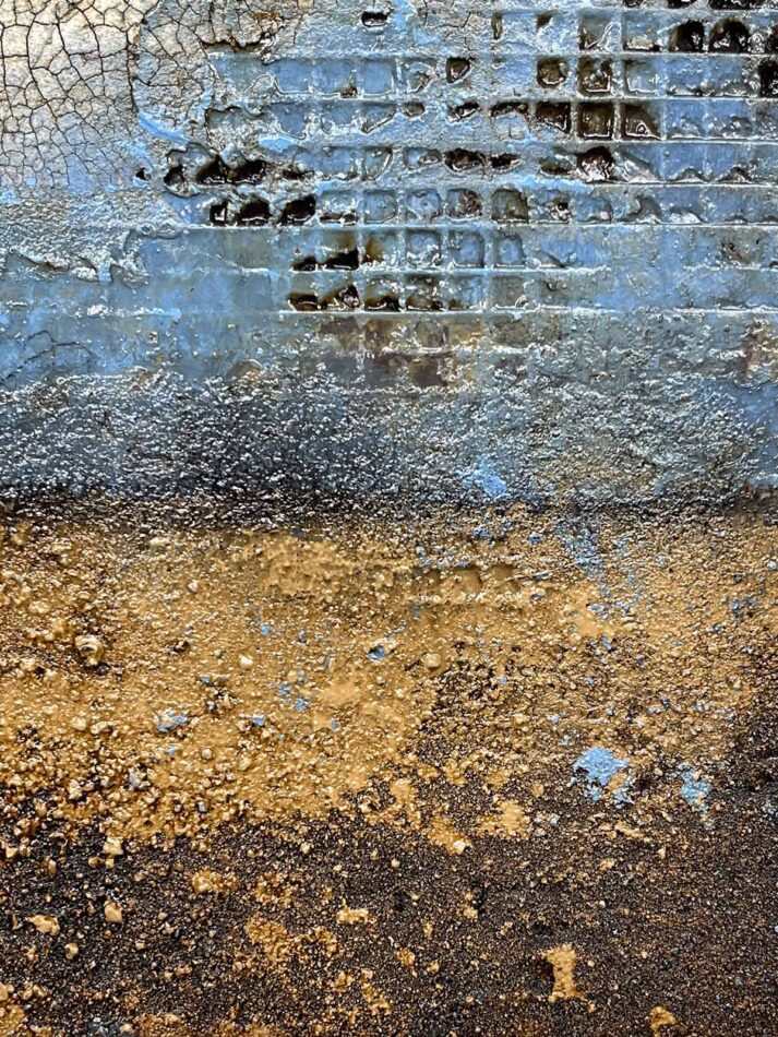 Surface detail of Distressed Surfaces No. 5 | cement, plaster, wire mesh, acrylic mediums, sand, latex paint, pencil, roofing tar, and polyurethane on cradled panel | 10.5” x 10.5” x 2” | 2024