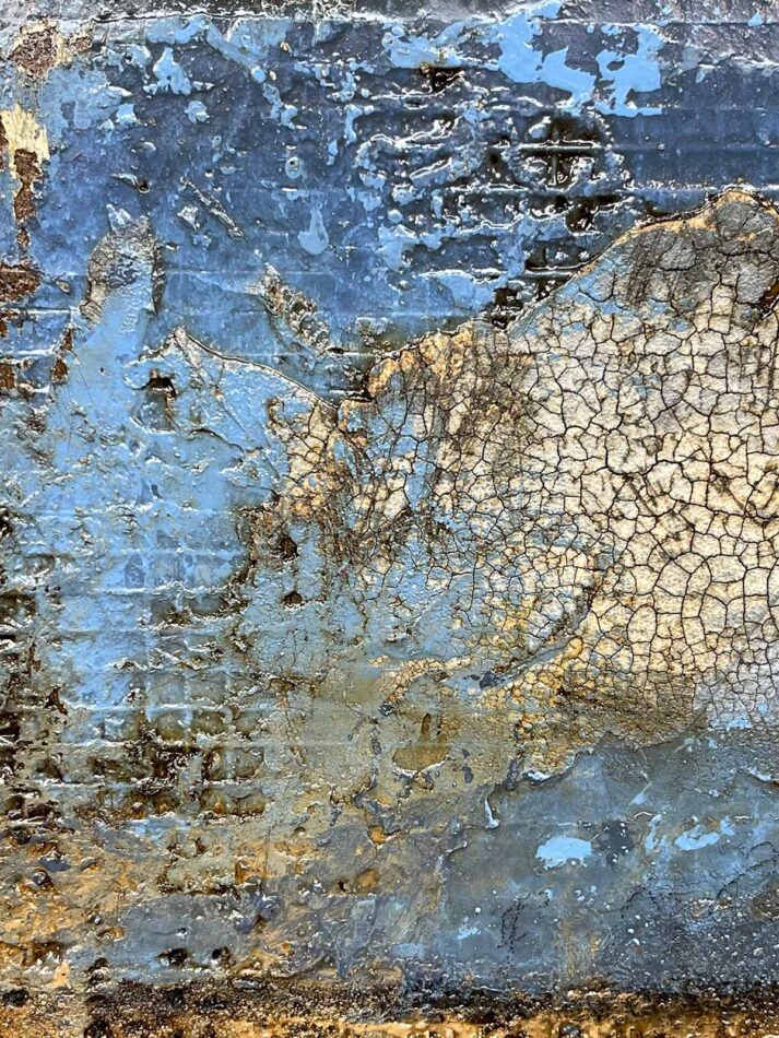 Surface detail of Distressed Surfaces No. 5 | cement, plaster, wire mesh, acrylic mediums, sand, latex paint, pencil, roofing tar, and polyurethane on cradled panel | 10.5” x 10.5” x 2” | 2024